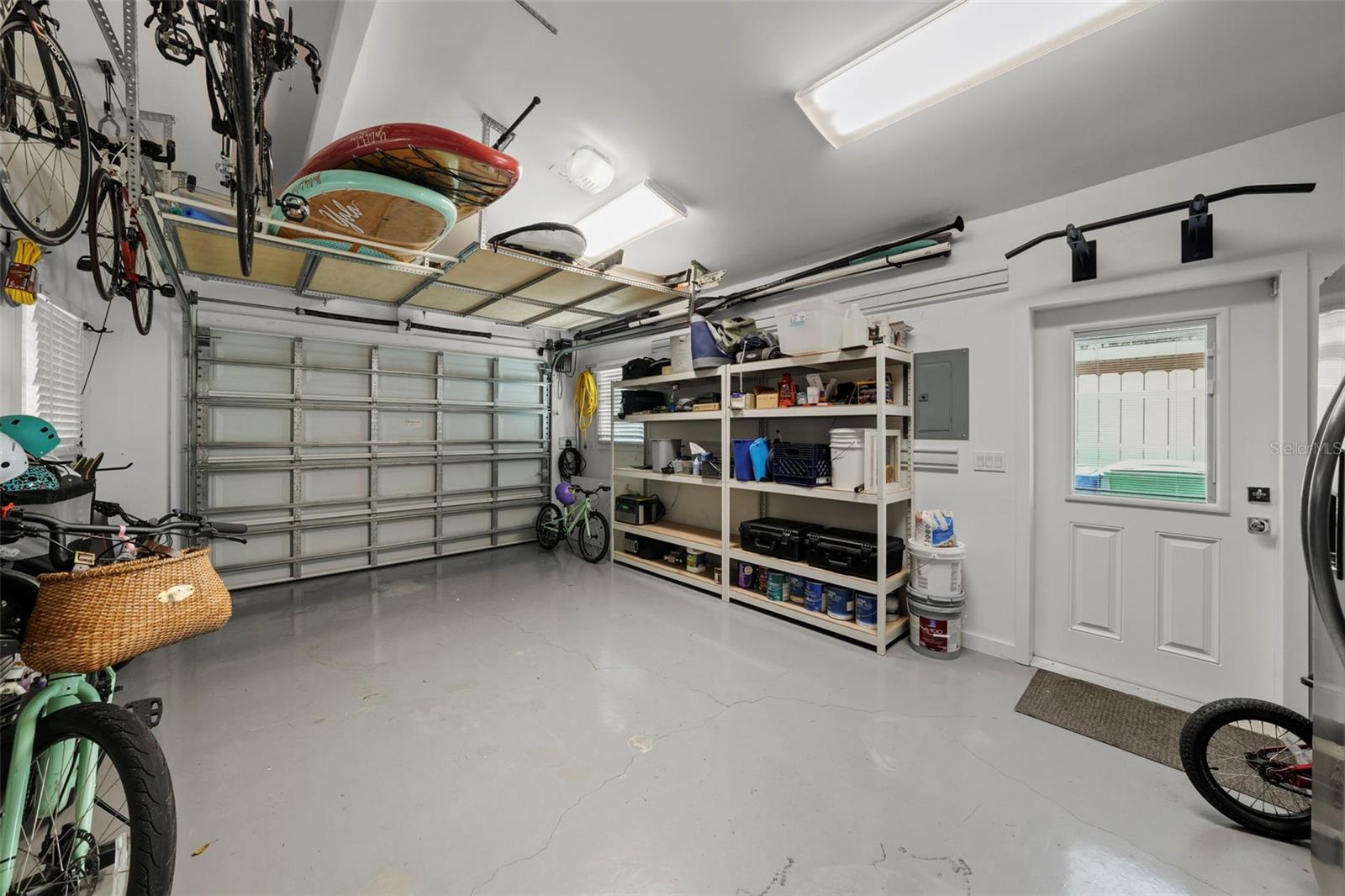 Garage has vaulted ceiling, added storage, insulation and fortified dry wall