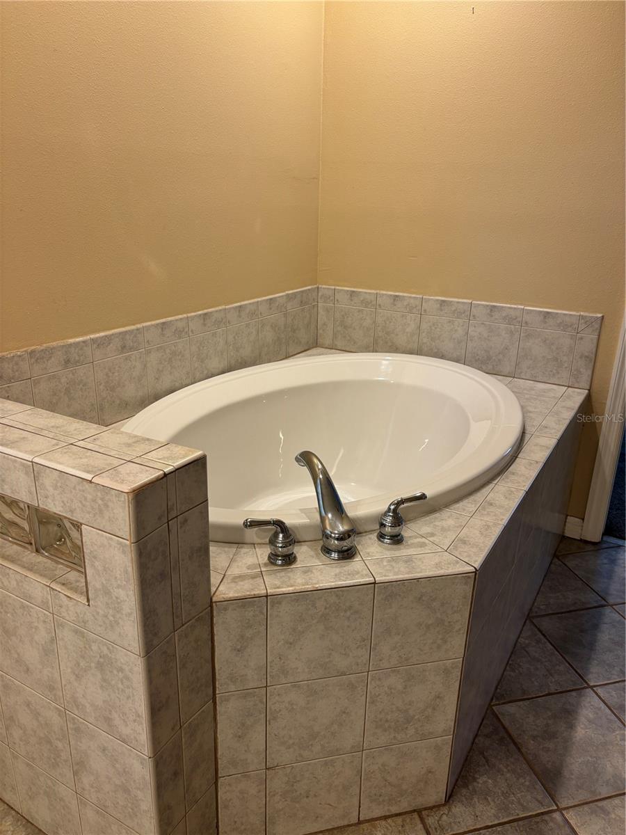 Primary bedroom bathroom tub