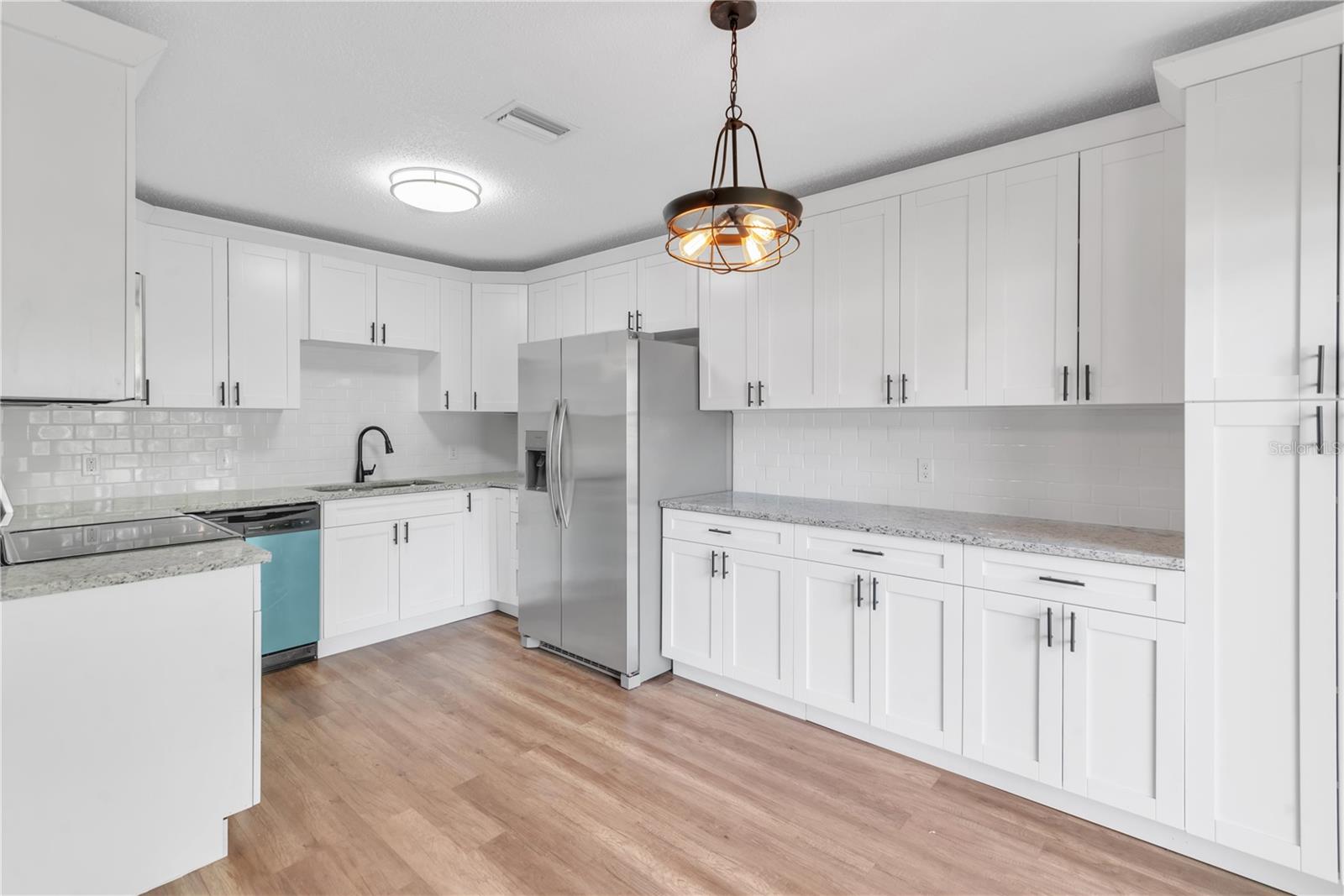 Kitchen with spacious new cabinets