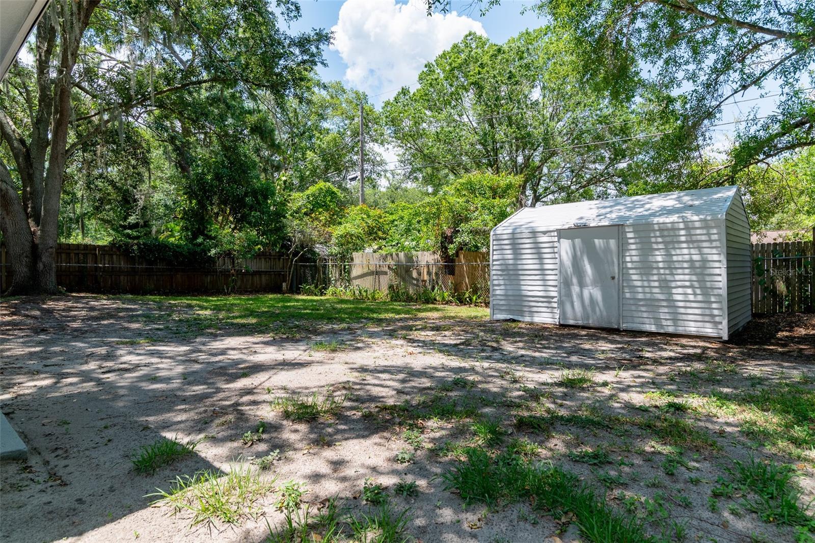 Large storage shed in back yard