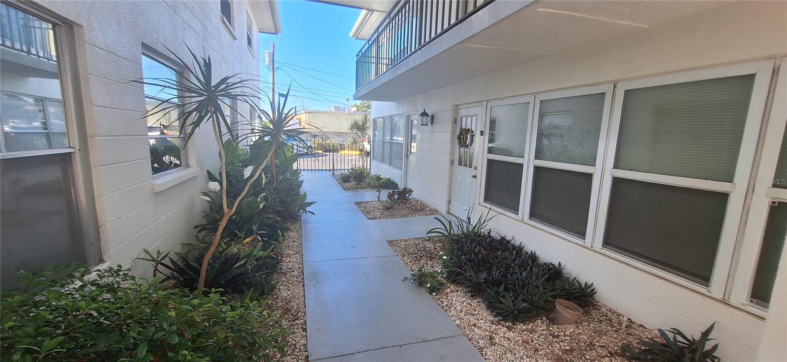 Side entrance to condo from parking lot.