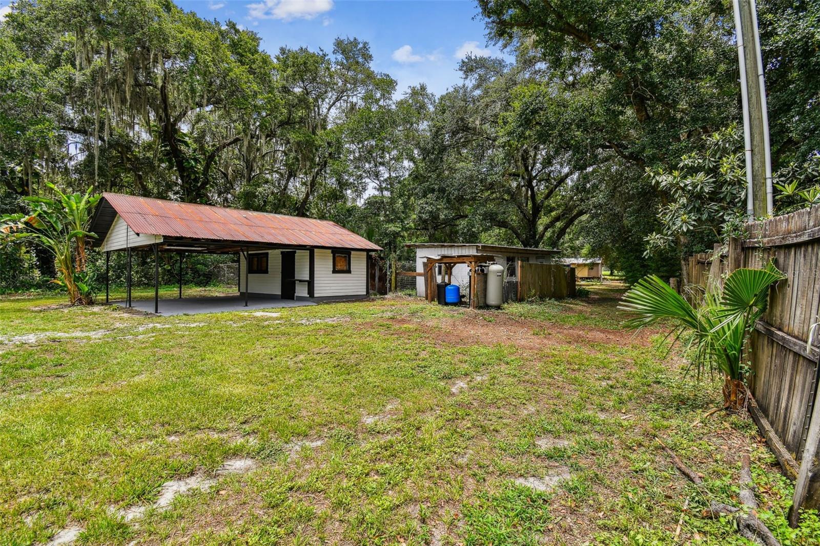 Backyard directly behind the main home