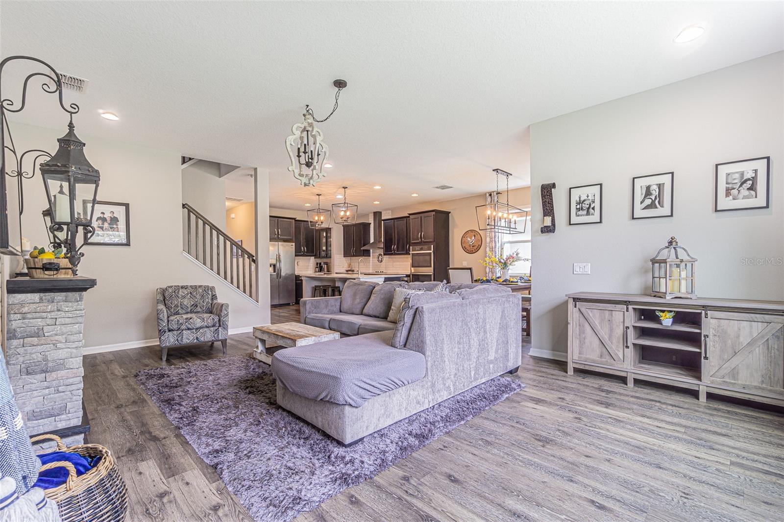 Large living room open to kitchen, but tucked away at the rear of the home