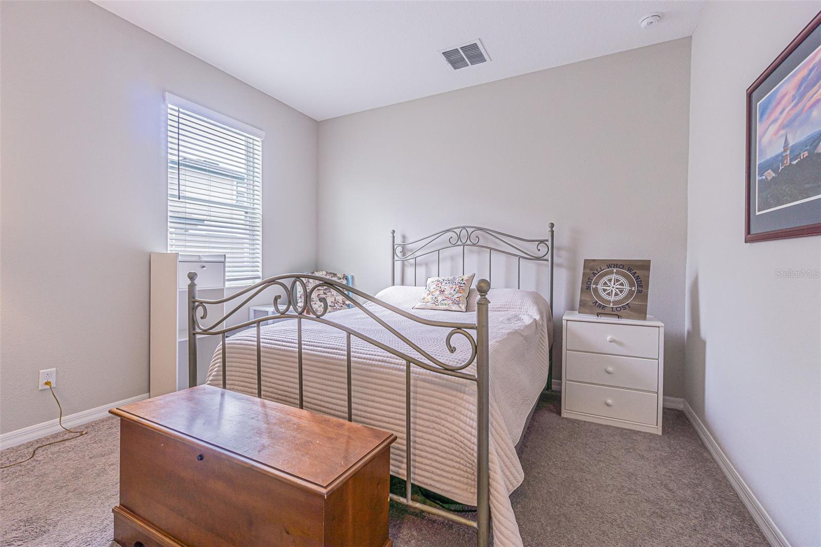 Downstairs bedroom 5, adjacent to full bath