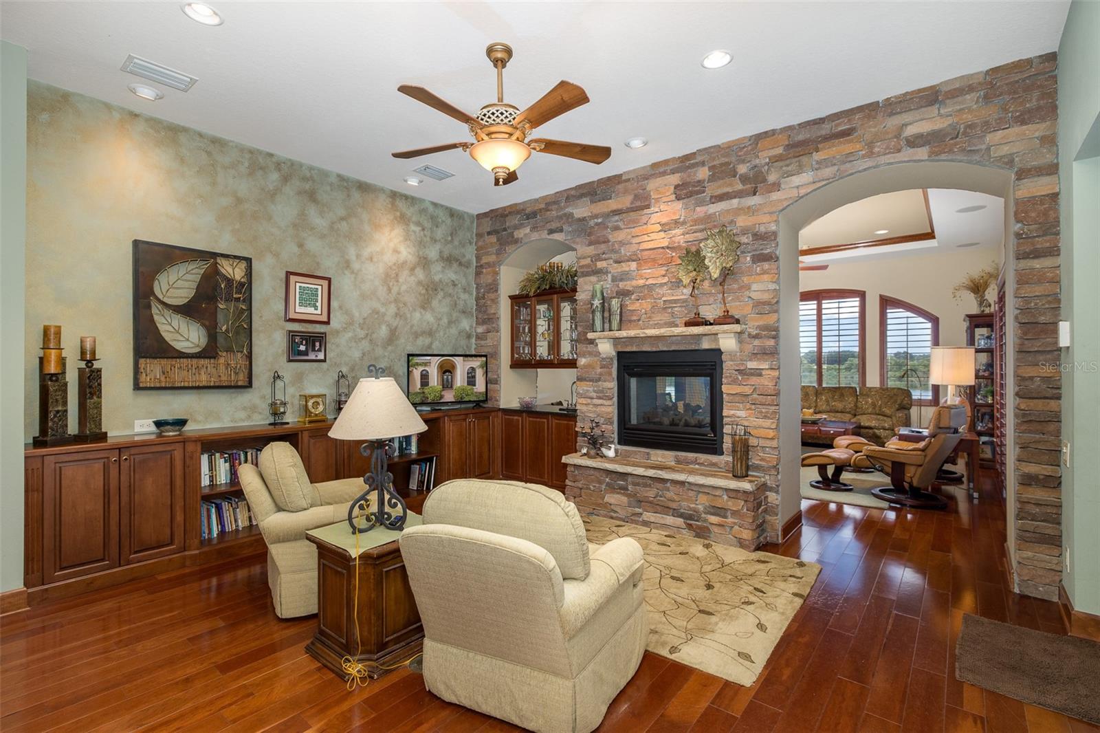 Family room w/stack-stone fireplace