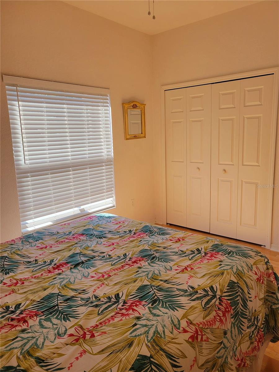 Bedroom 2 with double door closet