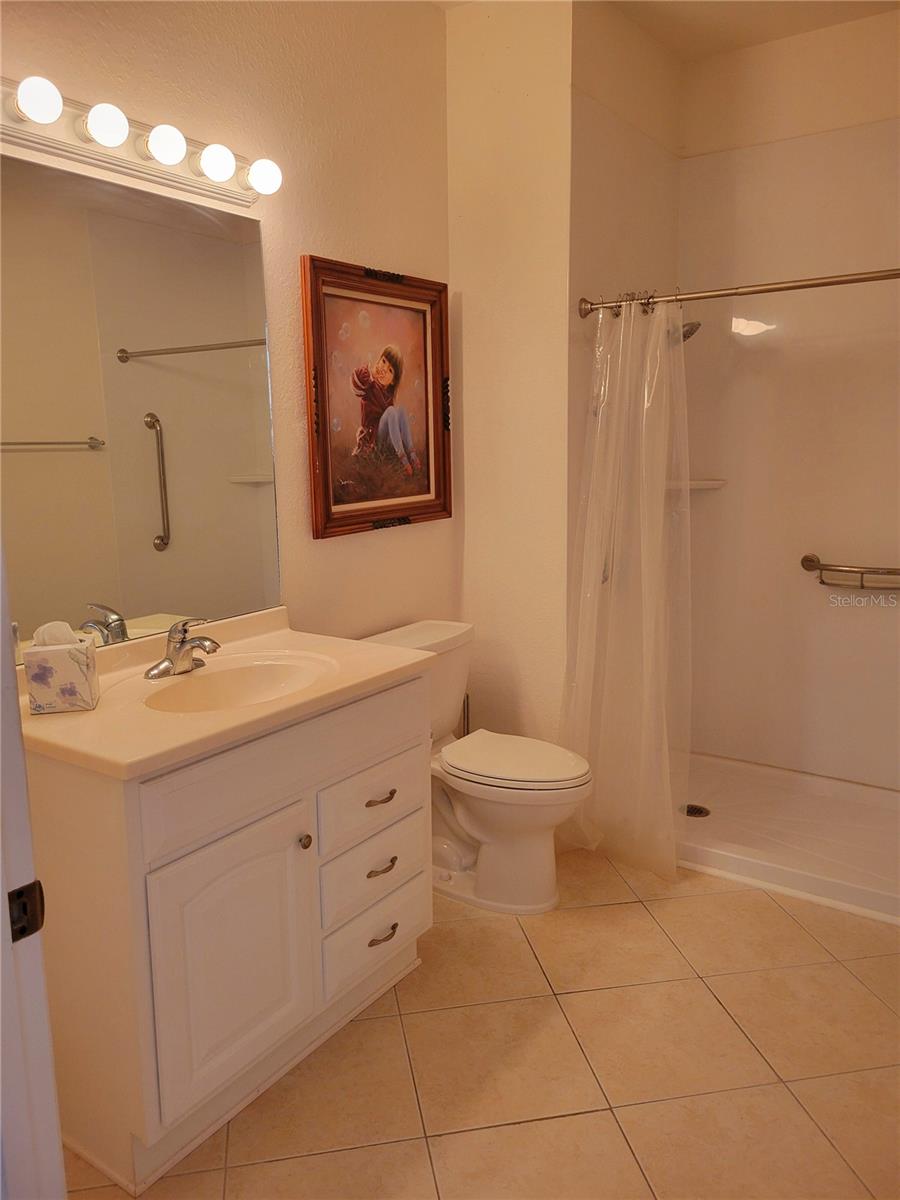 Bath 2 with high vanity and walk in shower for handicap or wheelchair needs