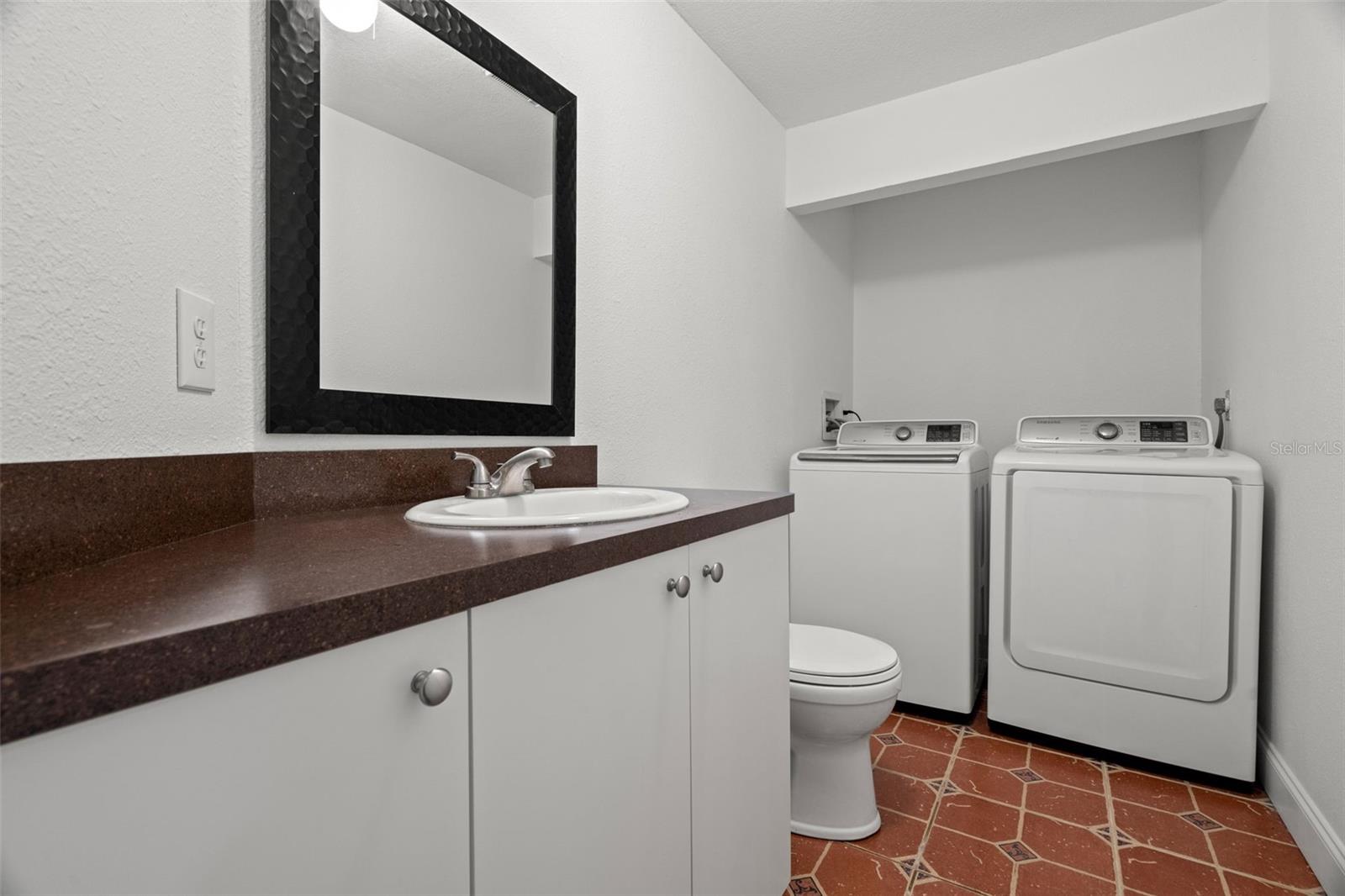 1/2 Bath and Inside Laundry, Washer and Dryer stay