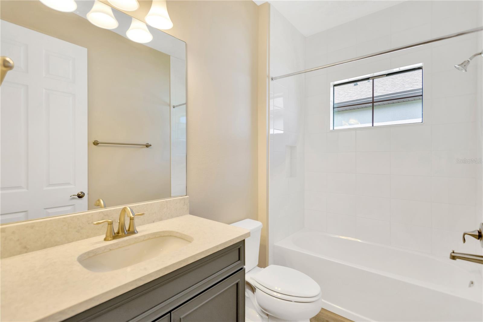 This guest bathroom is adjacent to the bedroom at the front of the home.