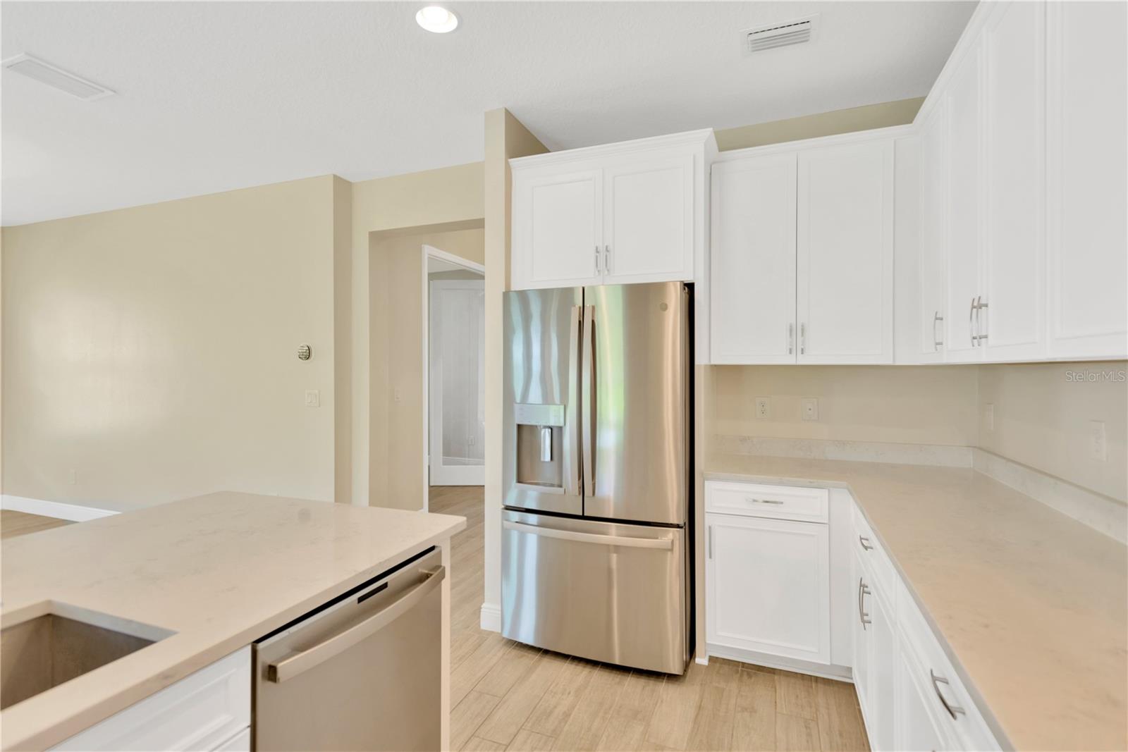 There is a lot of counter surface and work space in this kitchen!