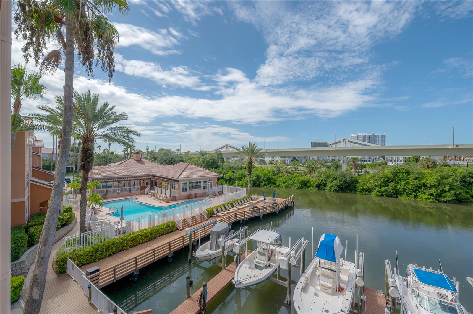 View of pool and marina from bedroom 2