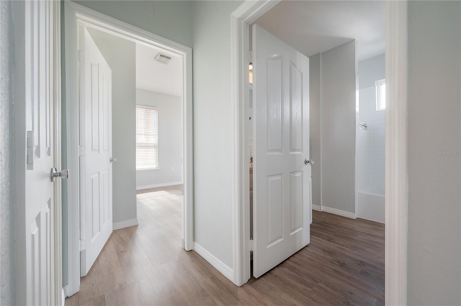 Entrance of bathroom and bedroom 2 from hallway