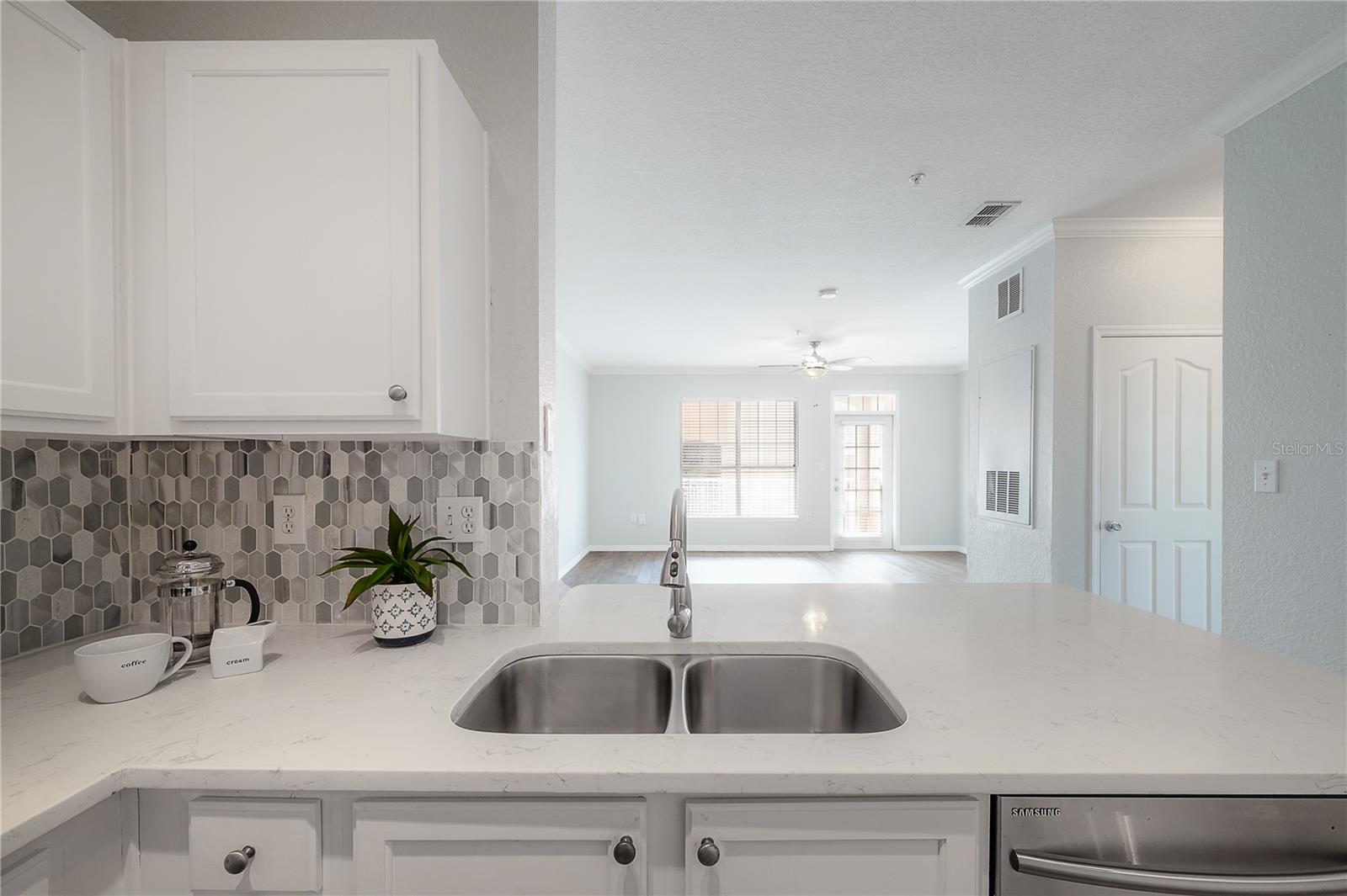 Spacious countertop with breakfast bar