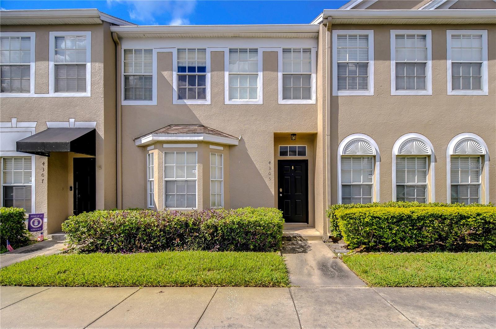 Stunning townhome in the sought-after gated community of Trafalgar Square!