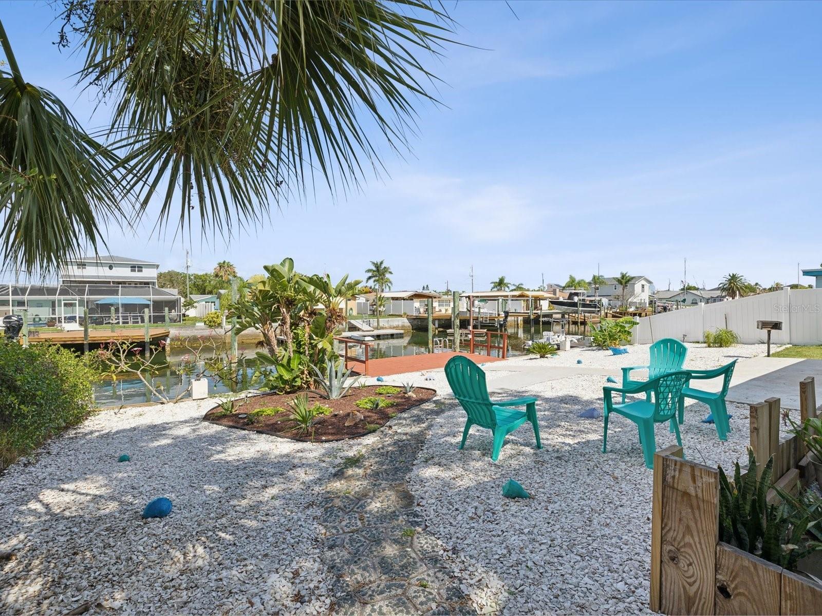 Solar lighting illuminates the landscape and seawall out back