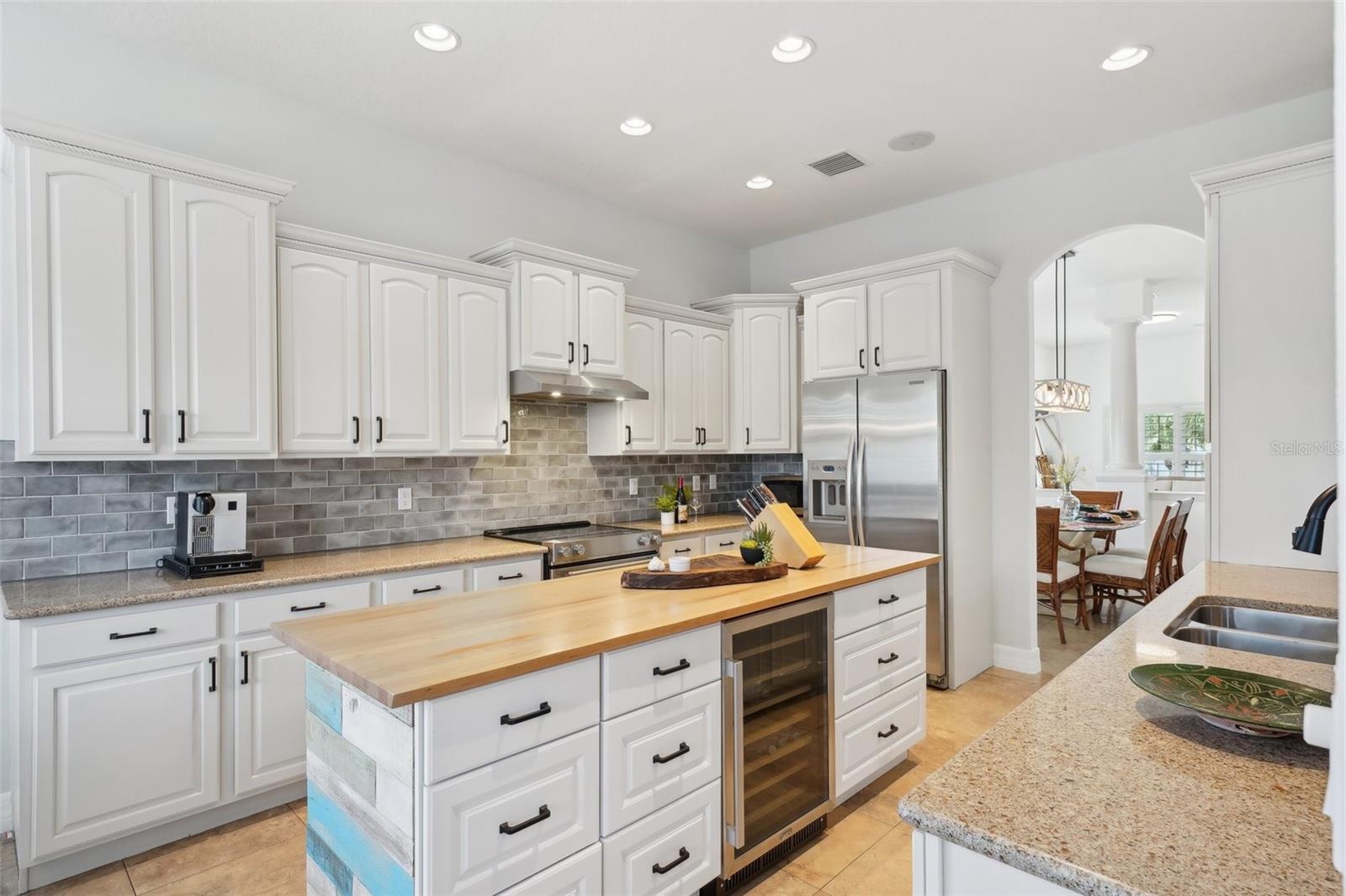 Chefs kitchen with tons of counter top space and storage