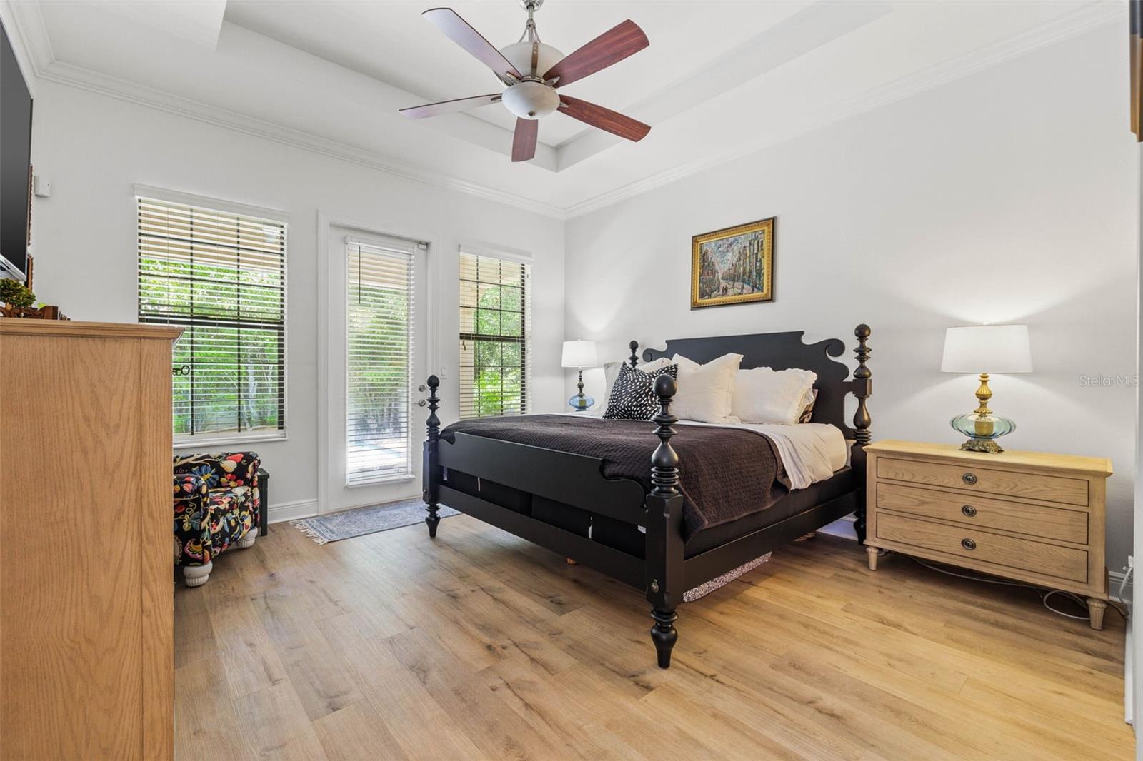 Primary Suite Overlooks the pool.