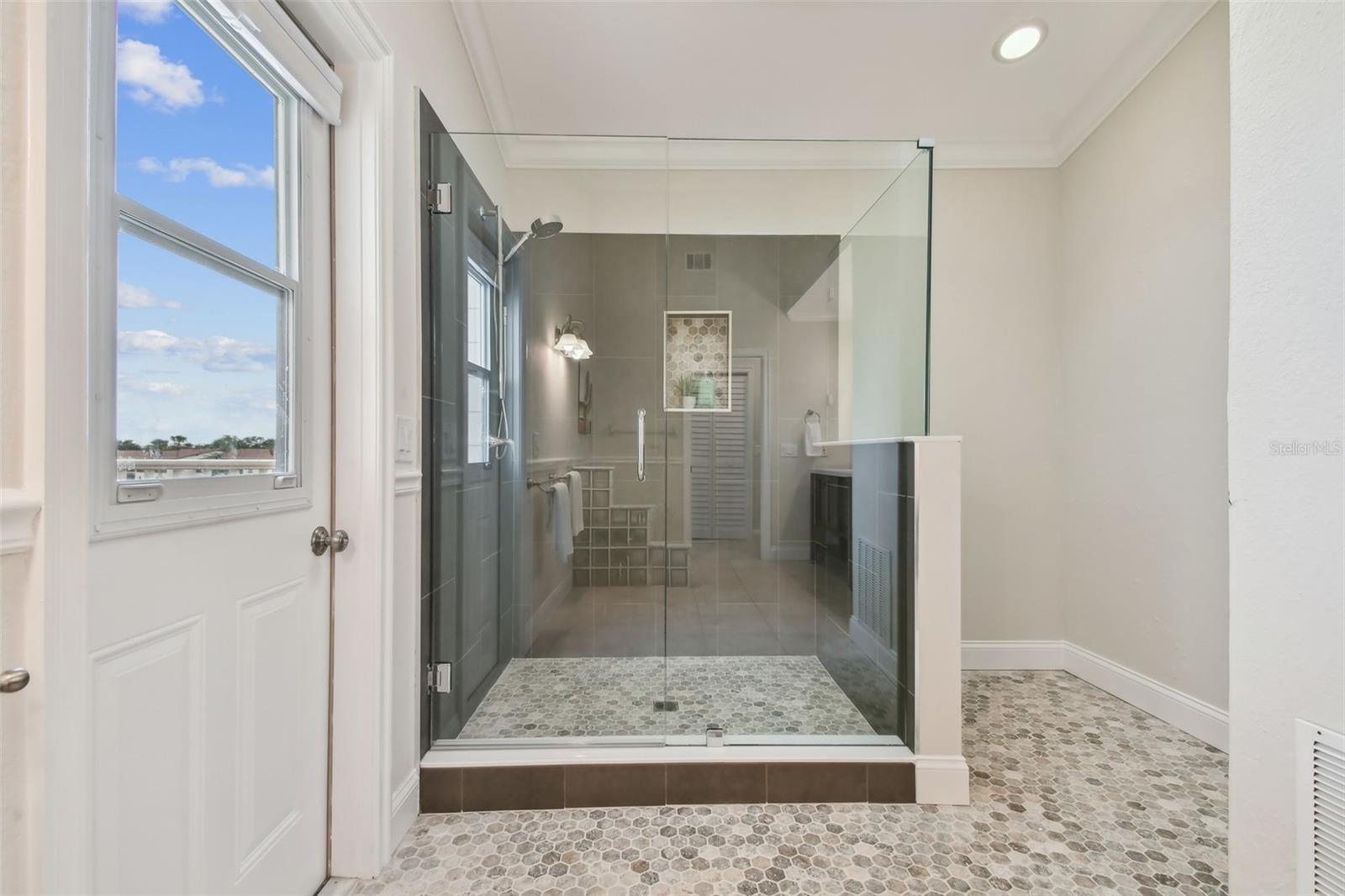 New walk-in shower with access to 3rd floor waterfront deck