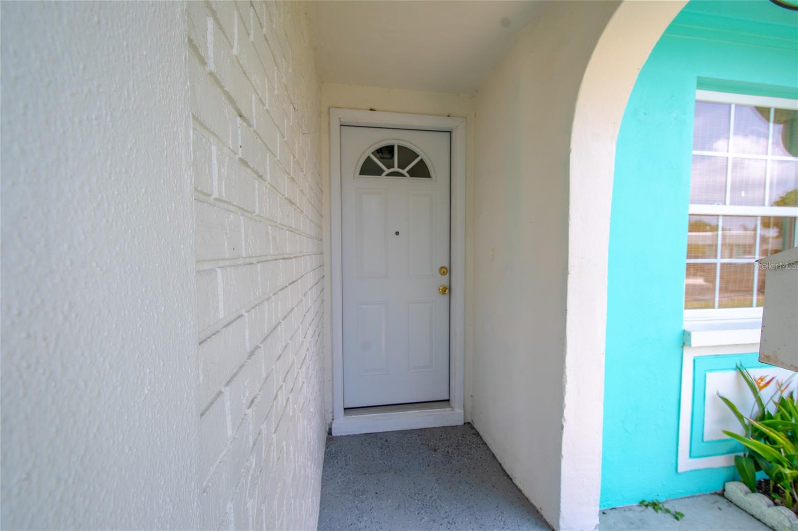 The condo features a covered entry.