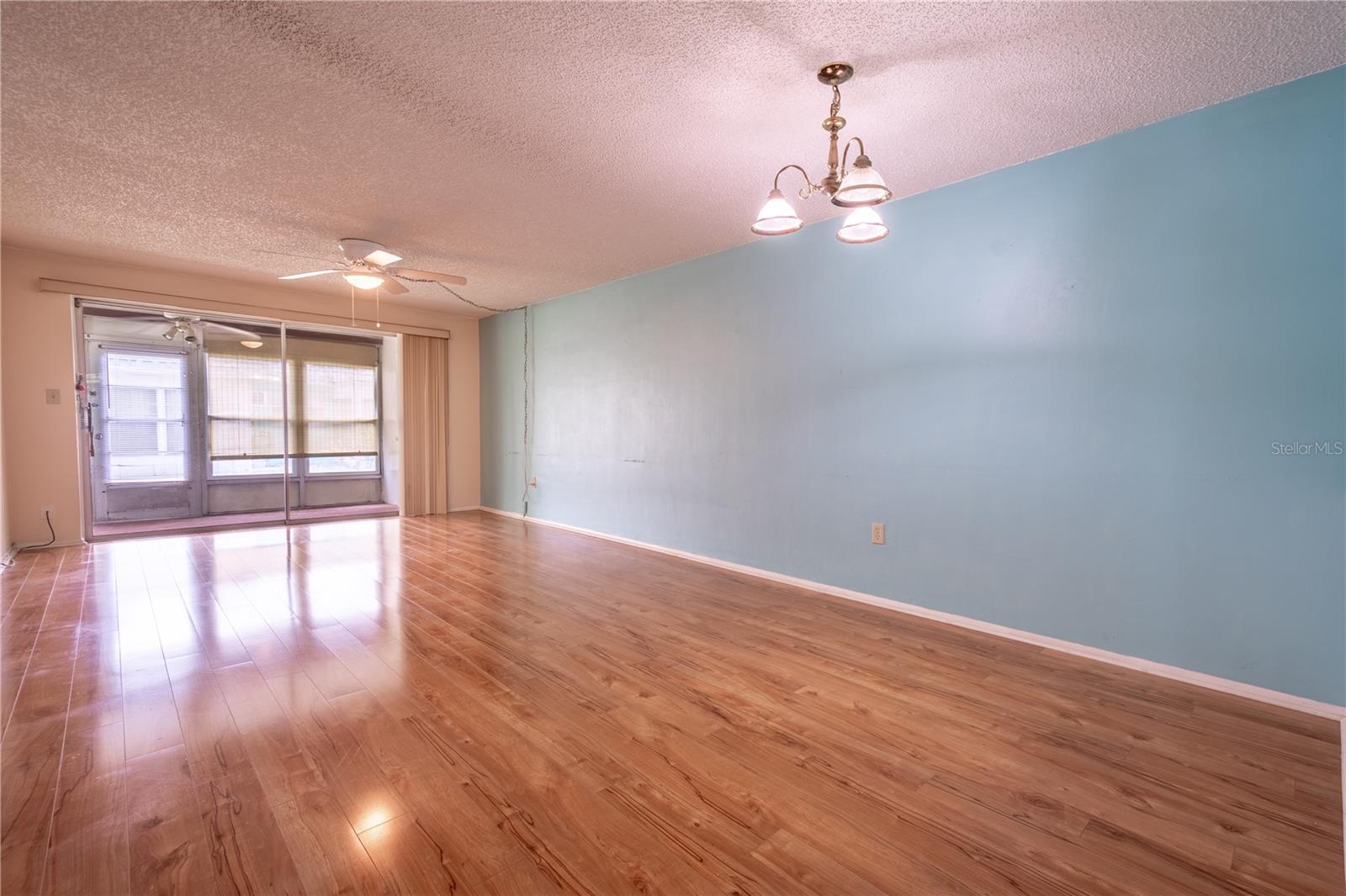 The dining room is open to the living and Florida Rooms.