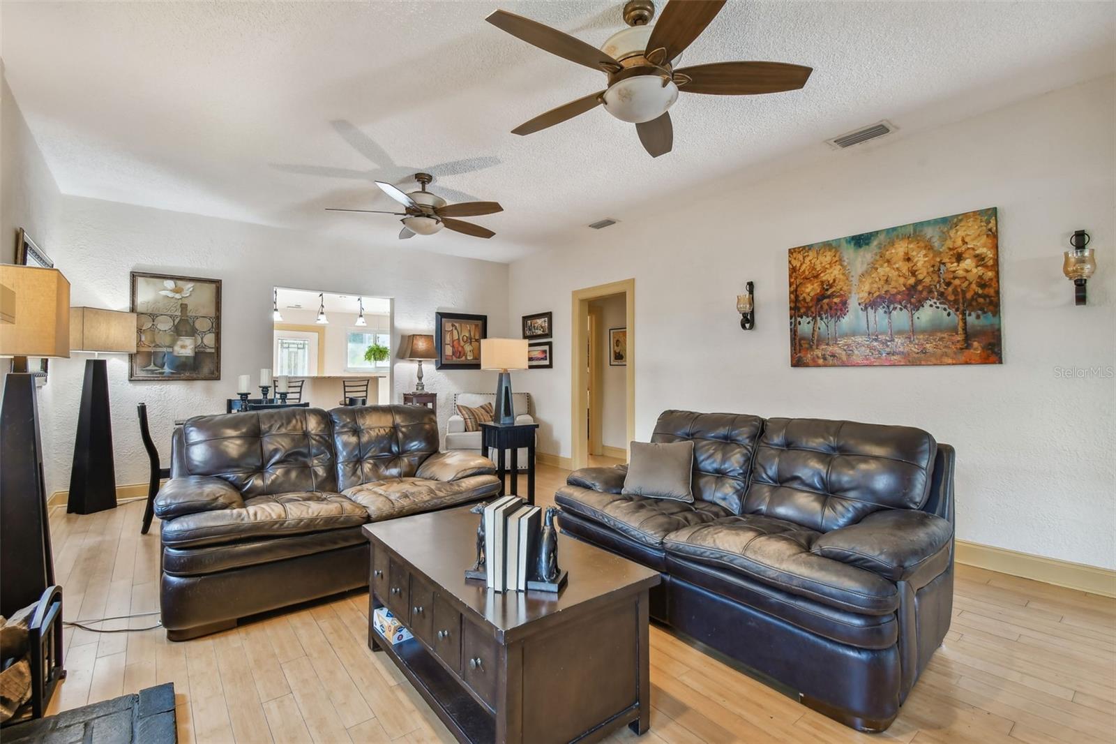 Charming and comfortable living space opens to dining area