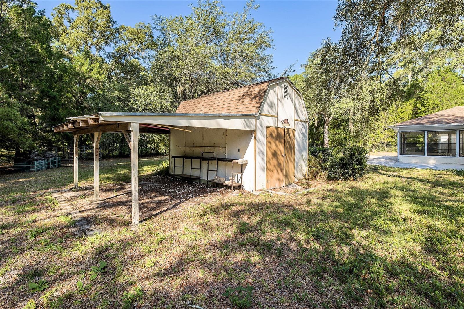 Storage shed that also houses pool equipment