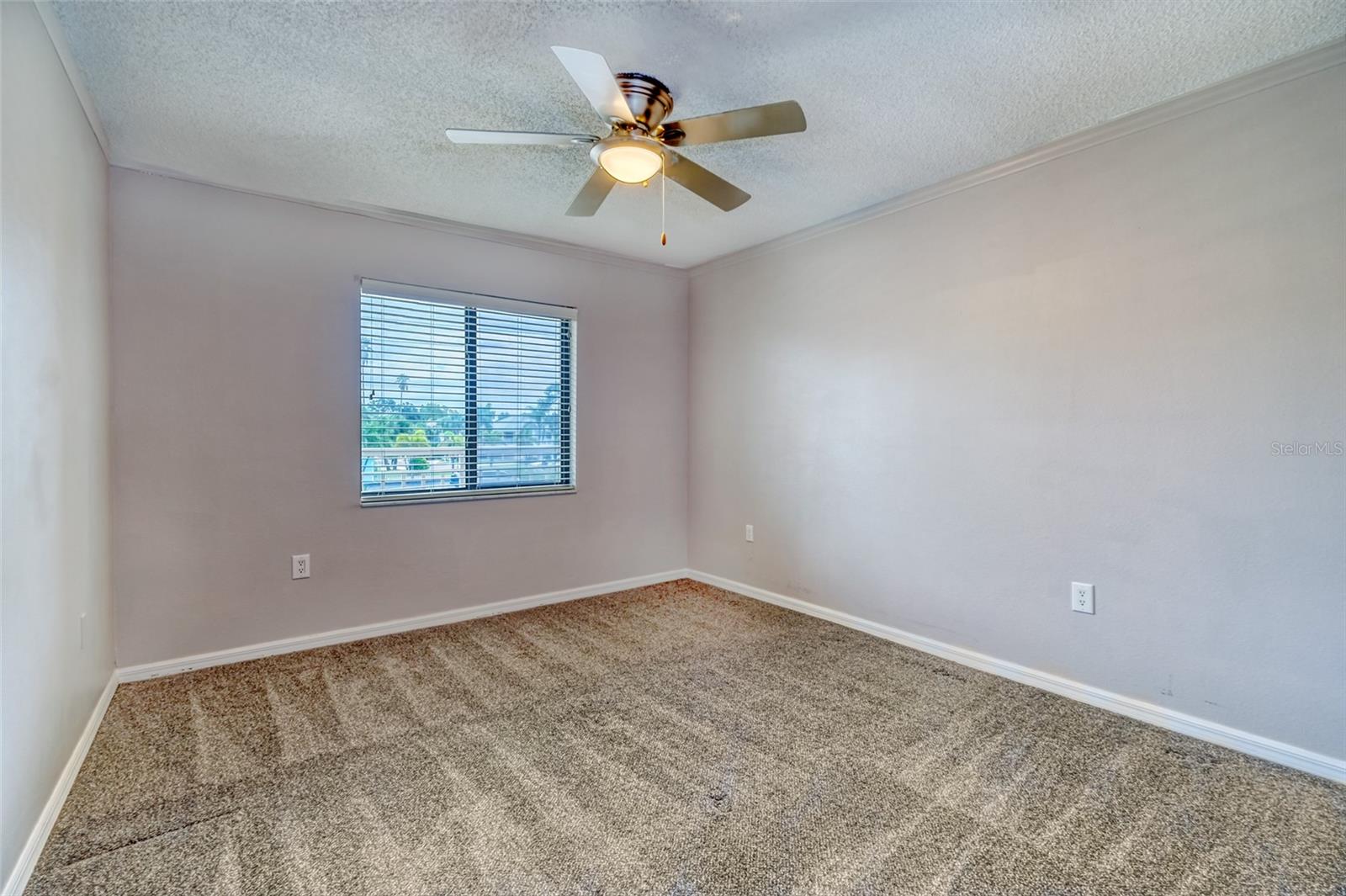 Guest bedroom with walk in closet