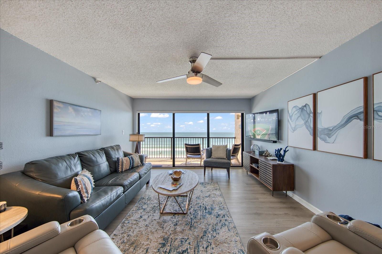 You have beach views from all angels in this large living room.  New furnishings and classy beach decor