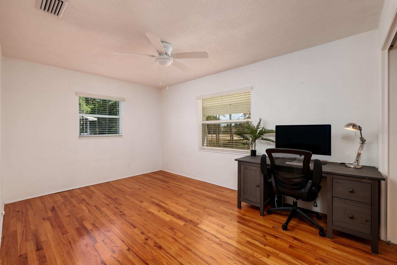 4th bedroom with built in shelves