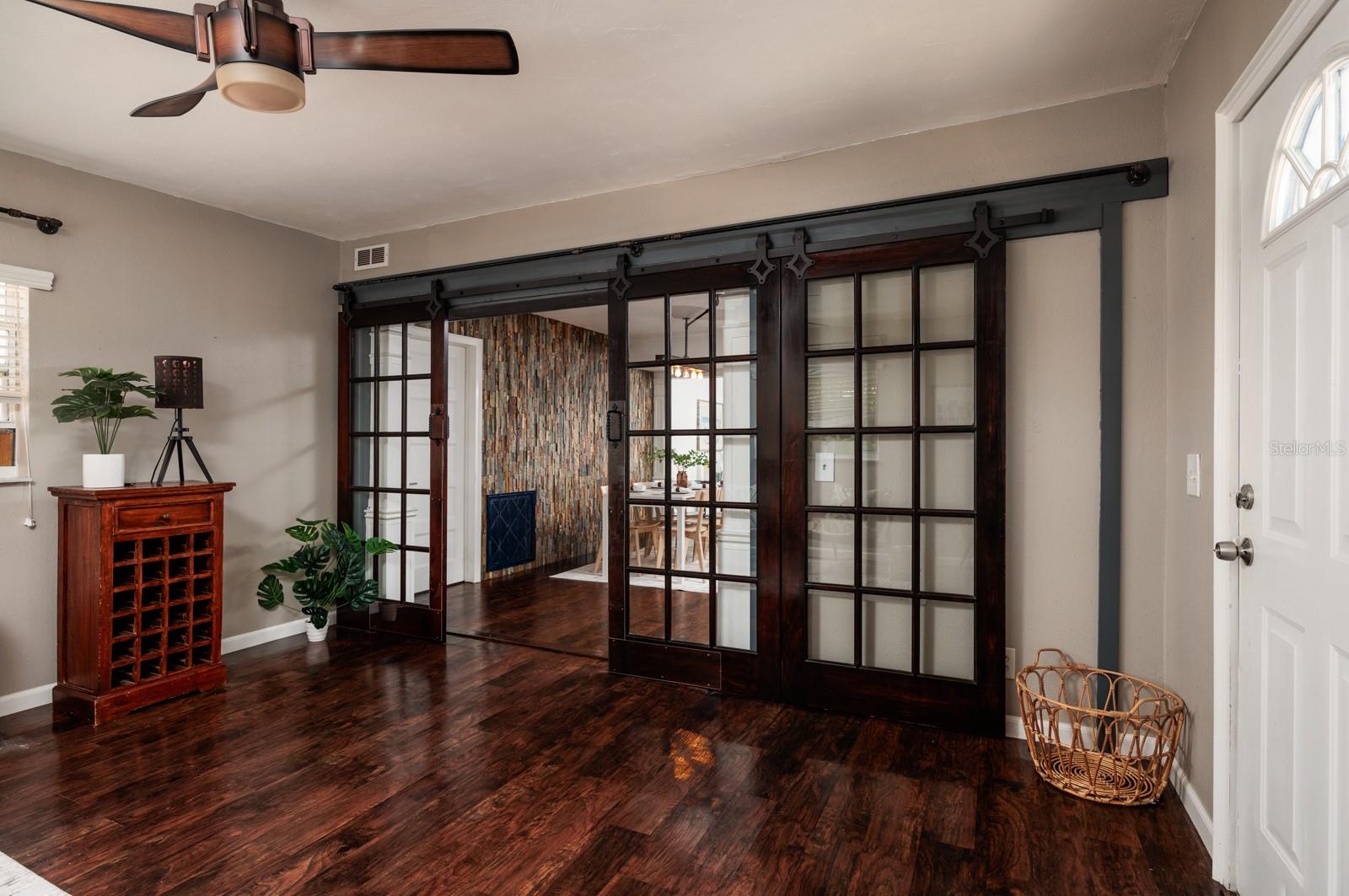 looking out from the Bonus Room - Florida Room to dining/living/kitchen