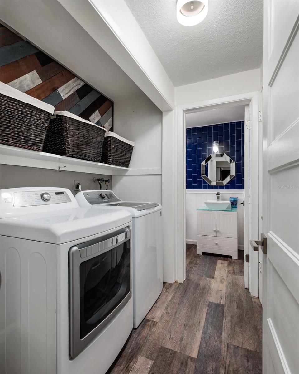 Laundry & powder bath off the main living area