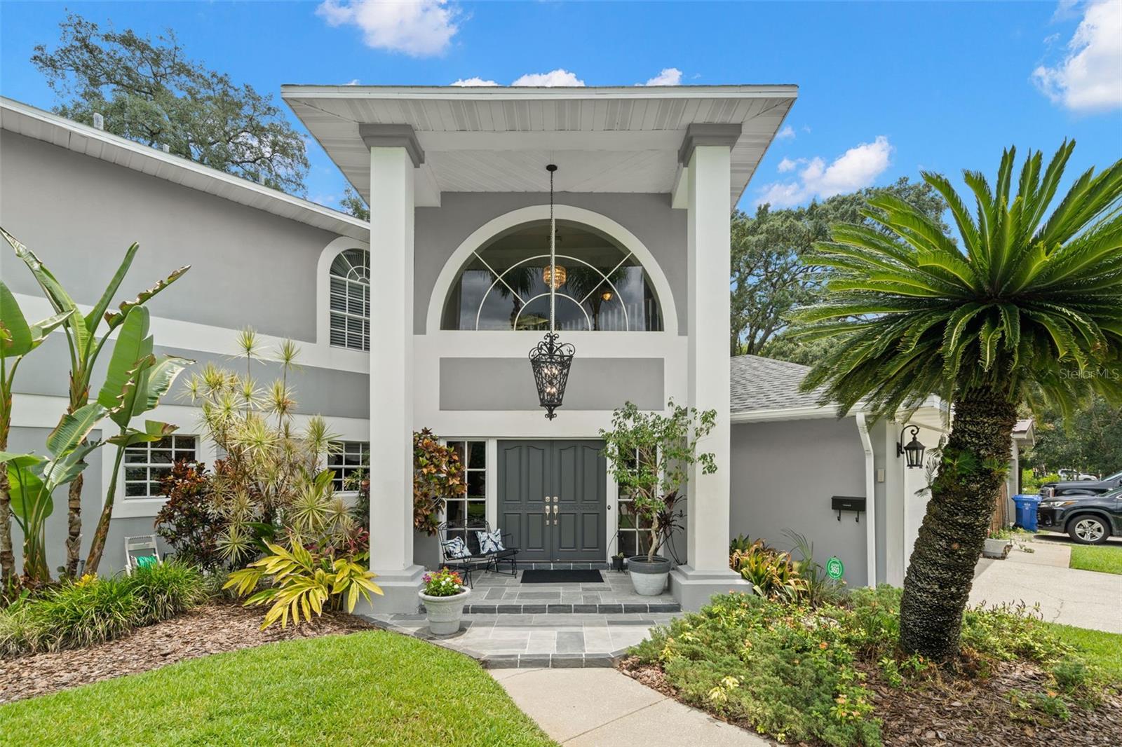 Grand entry with covered front porch