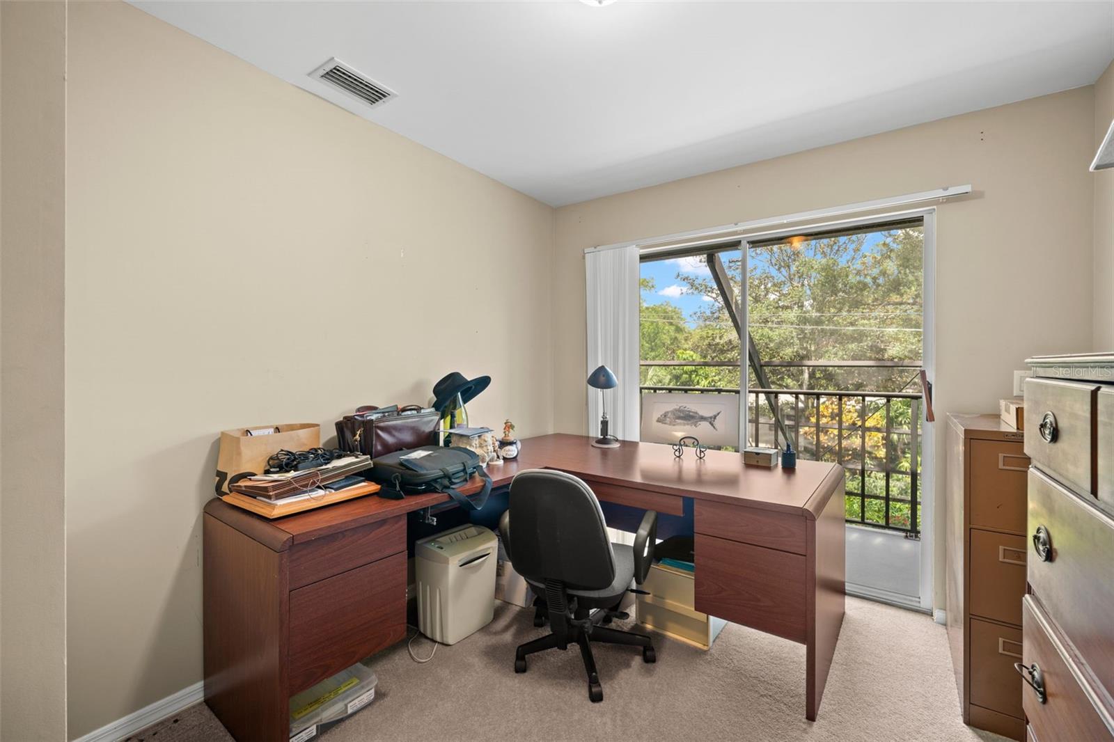 Upstairs bedrooms all have sliding doors leading to the balcony