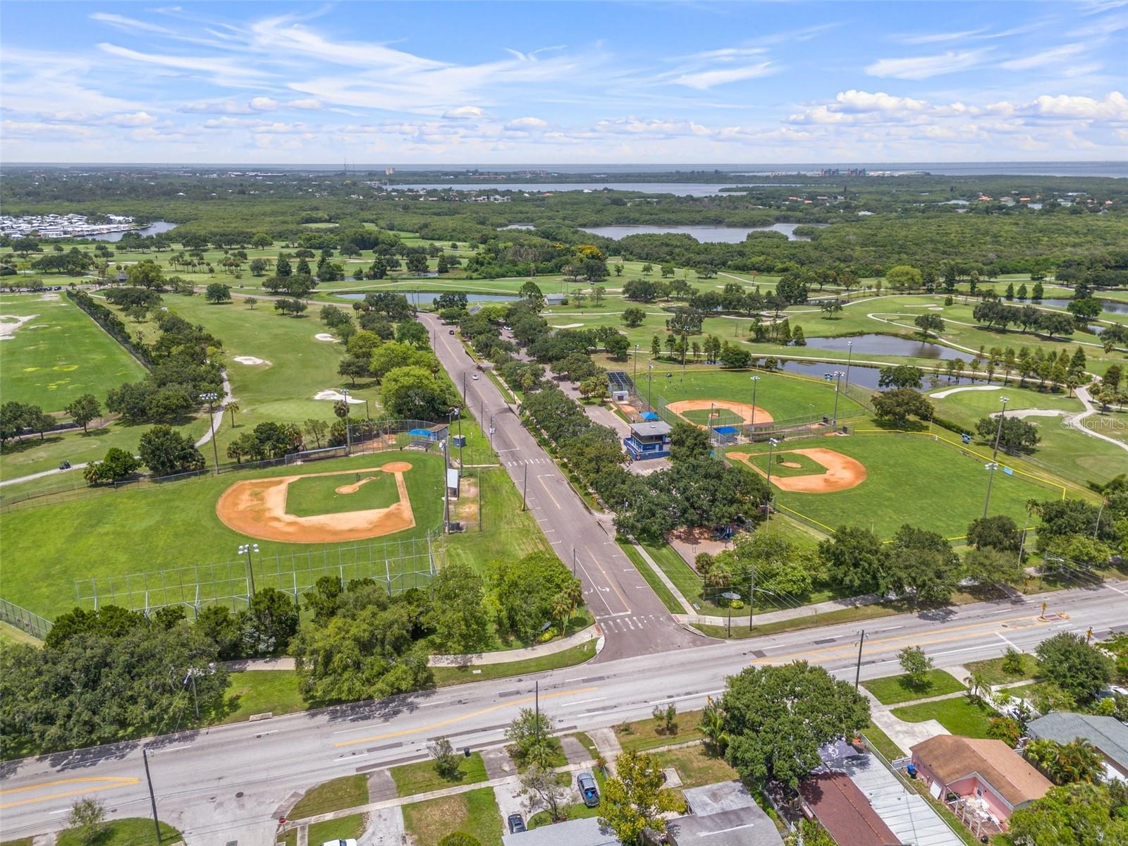 Northeast Park with baseball fields, Mangrove Bay golf course and Cypress Links (9 hole course) is across the street!