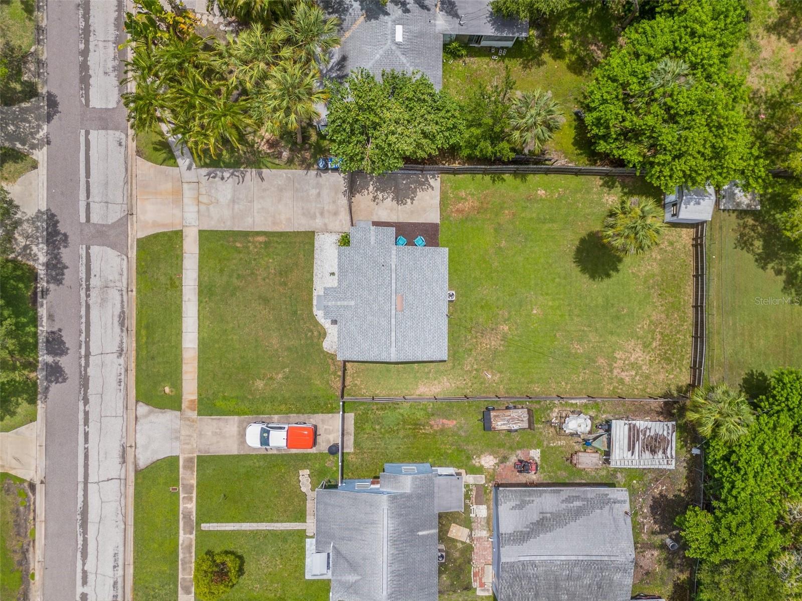 Large cleared lot with plenty of parking in expanded driveway