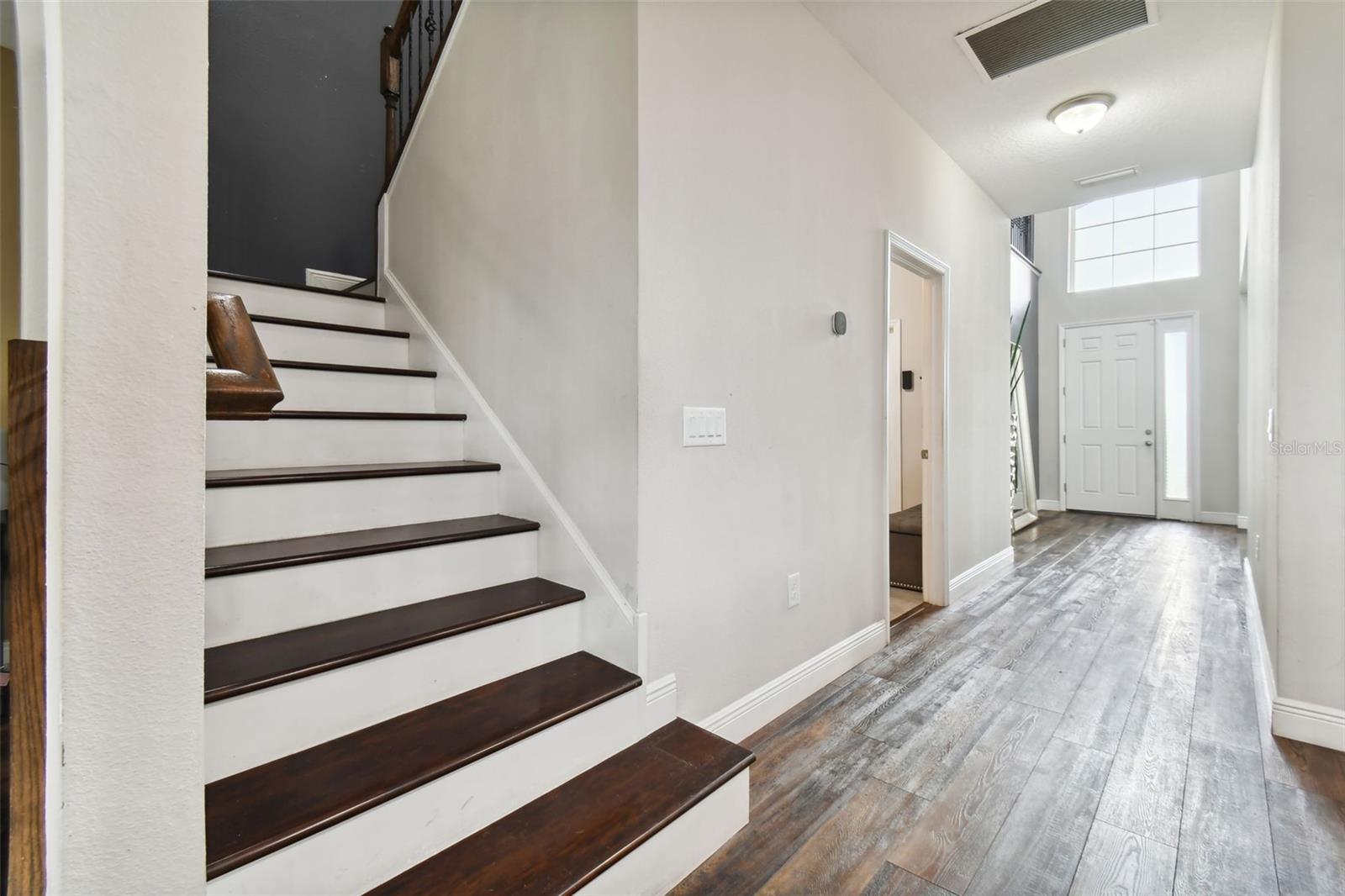 Beautiful wooden stairs with wrought