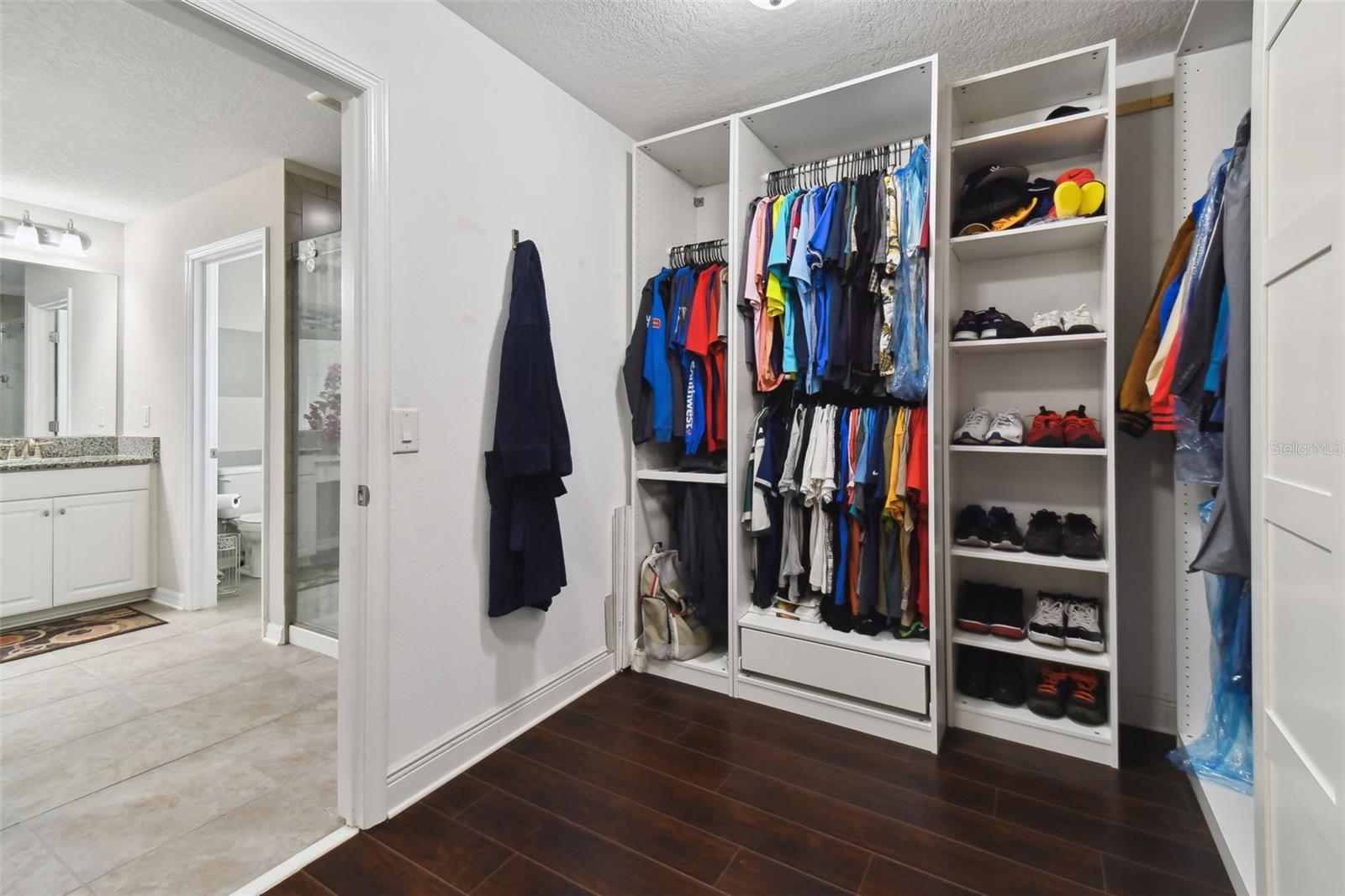 Custom built closet in primary