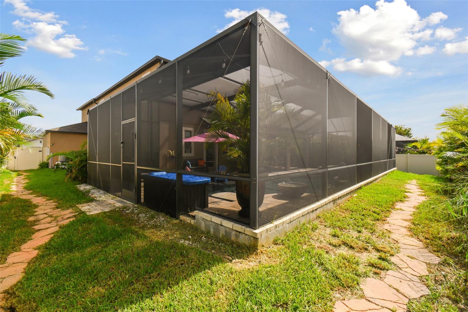 Oversized screened in pool-extended the screen to the edge of the home for maximum entertainment