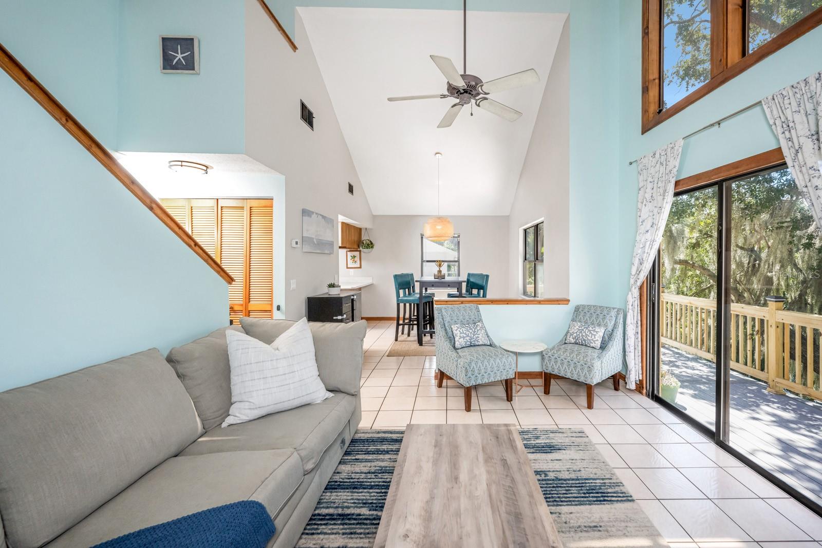 Great room leading to dining room and kitchen