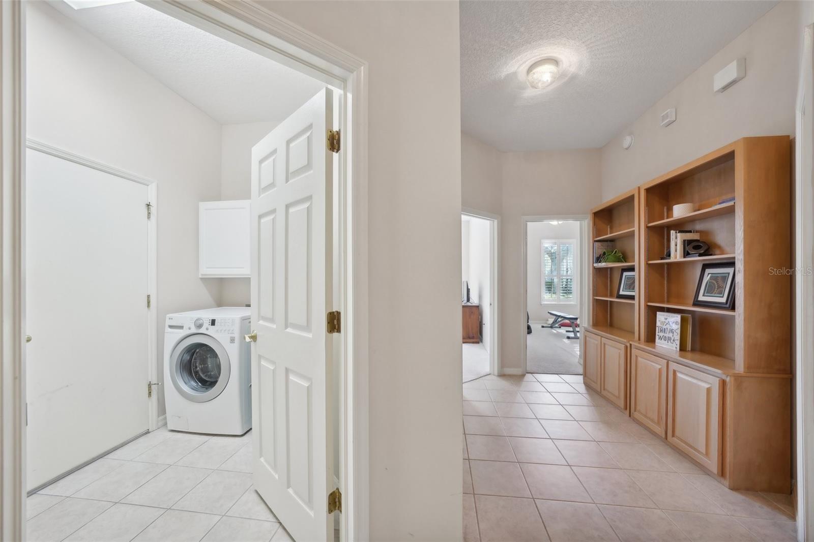 Hallway to laundry room and bedrooms