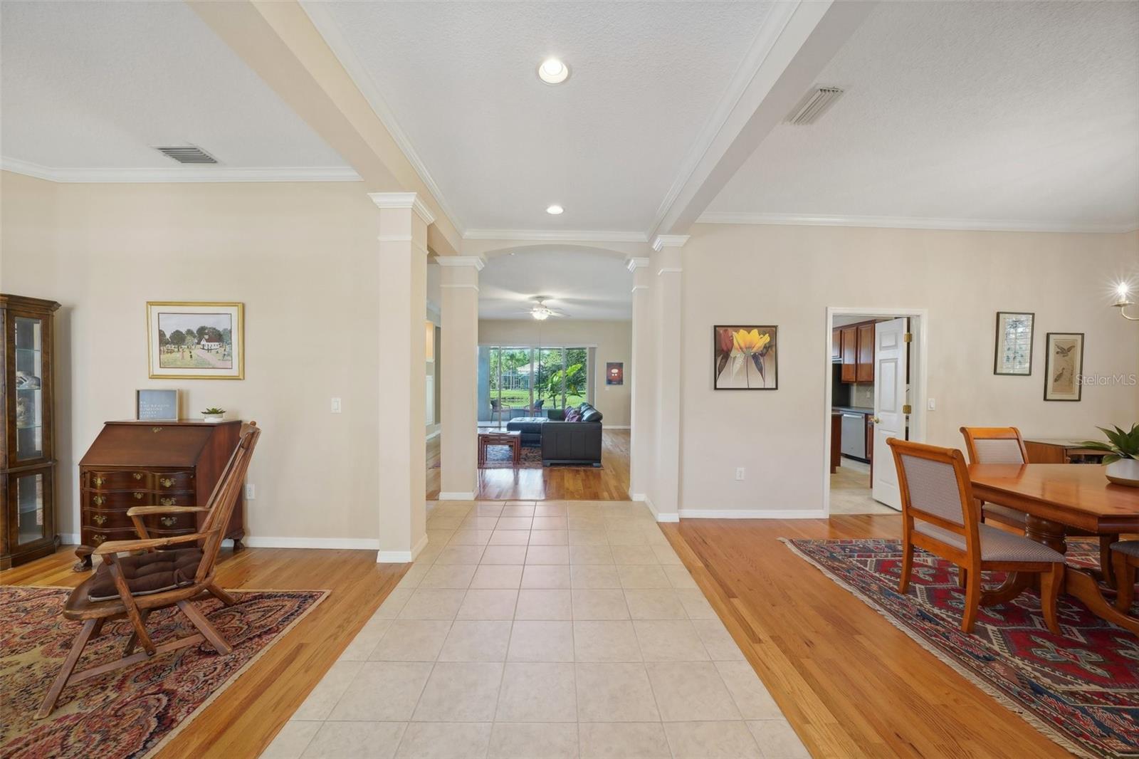 Front door view of living room, dining room, and great room