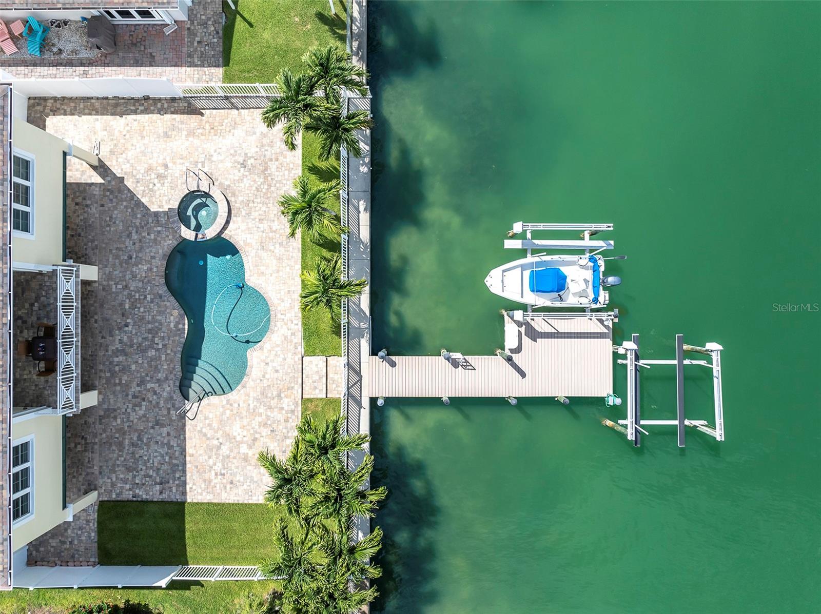 Saltwater pool and 2 10,000 pound boat lifts