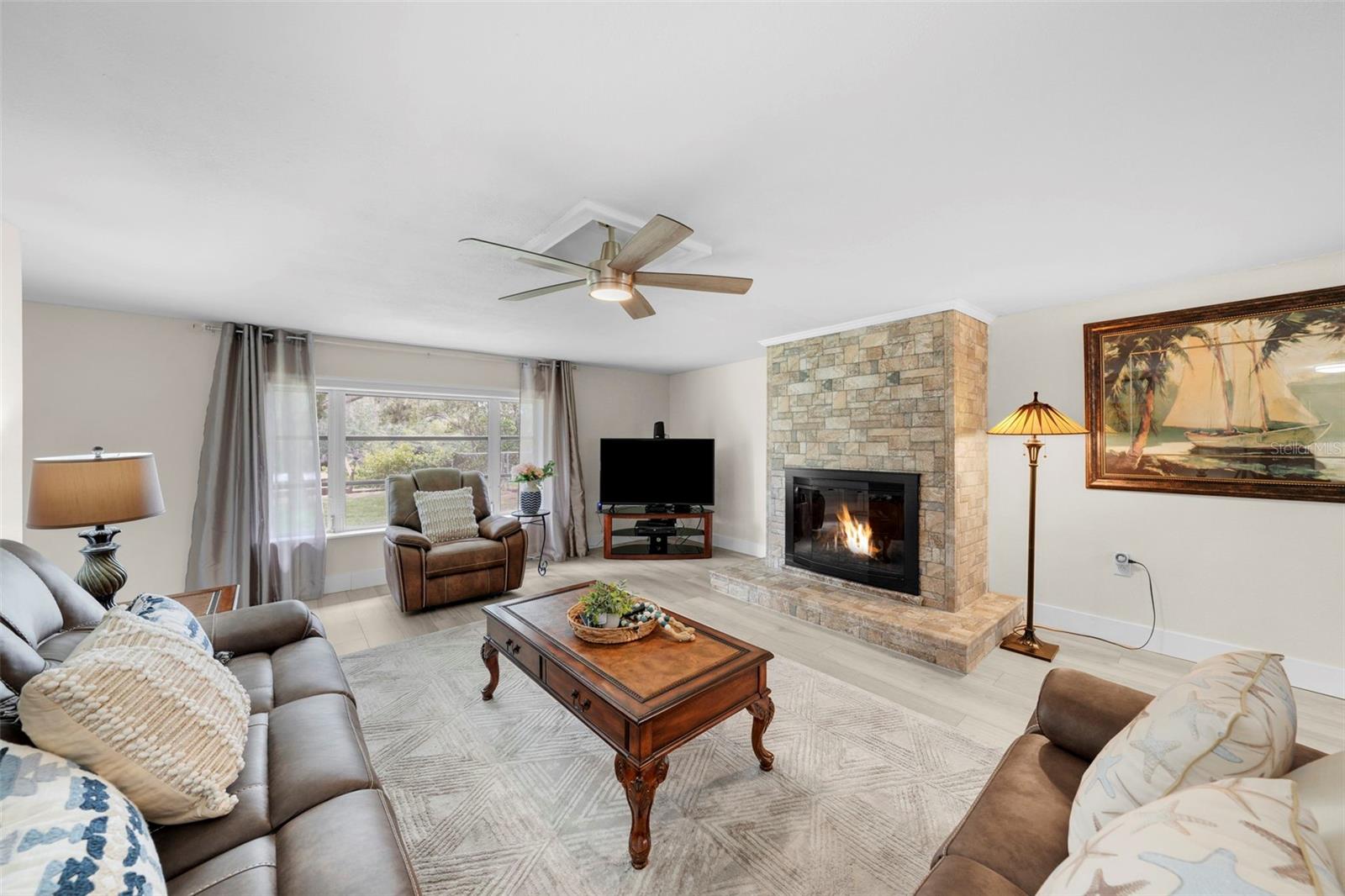 Family Room with fireplace; Water views