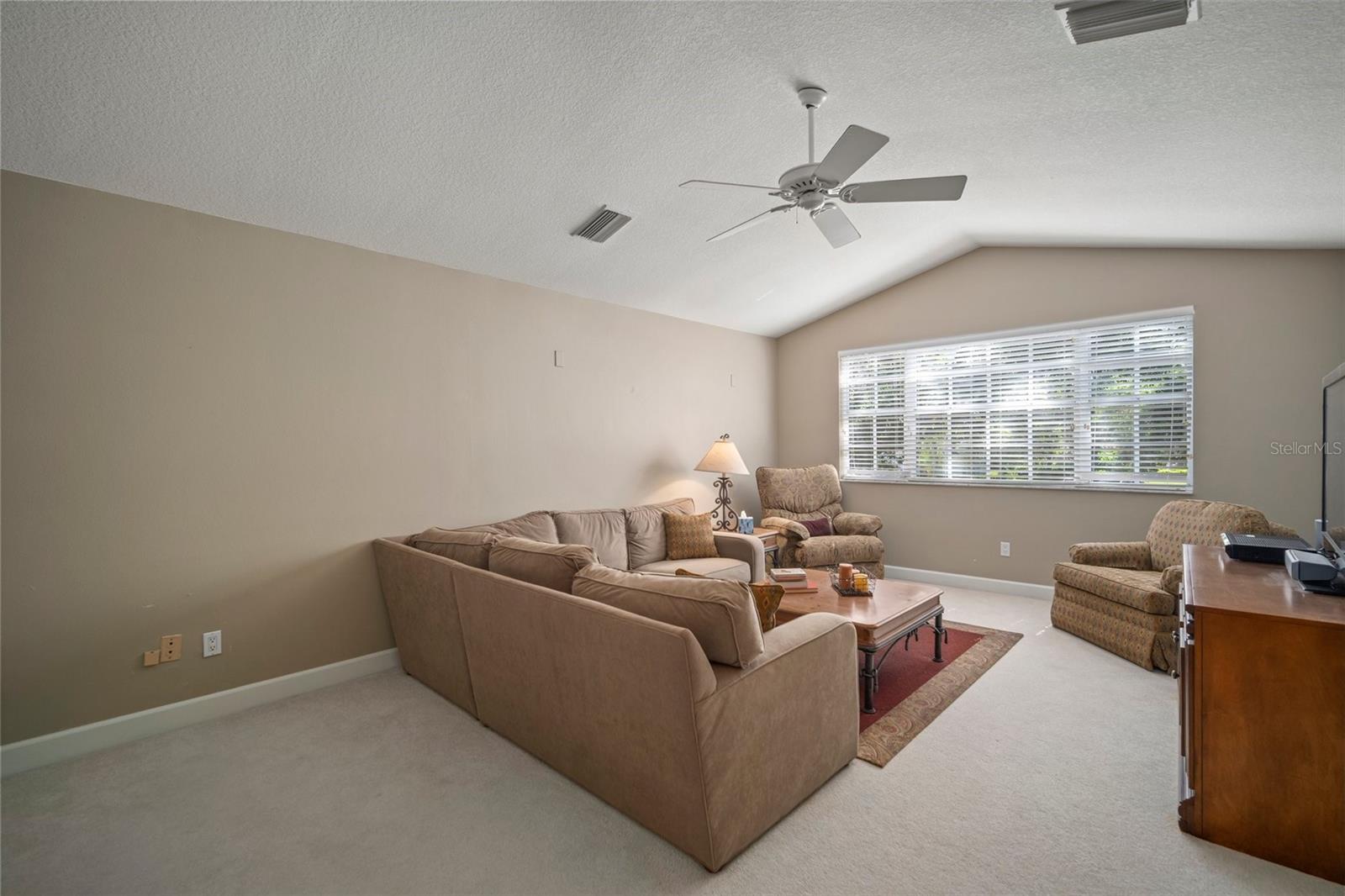 Upstairs bonus room with walk-in closet