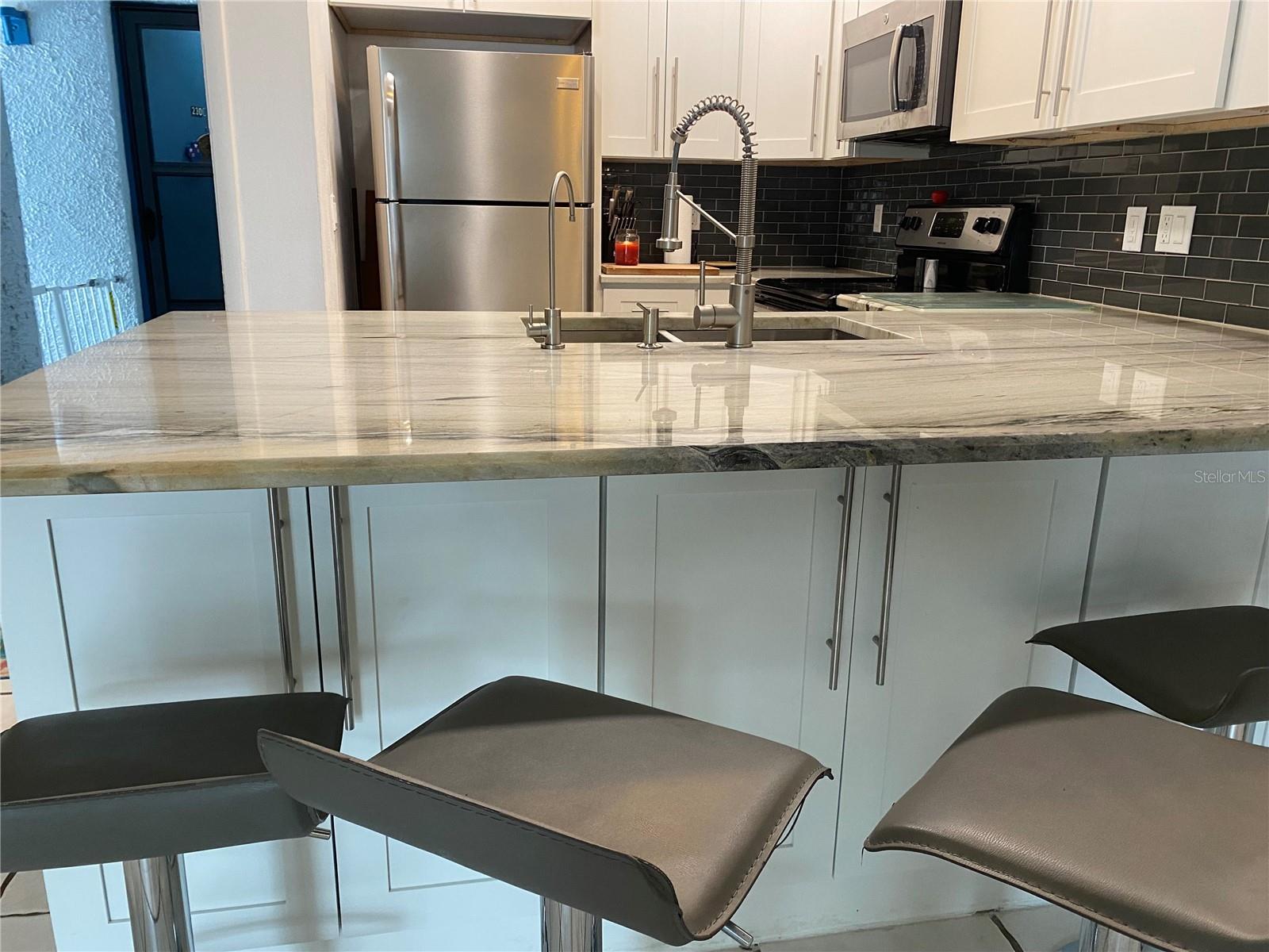 view of kitchen cabinet storage underneath