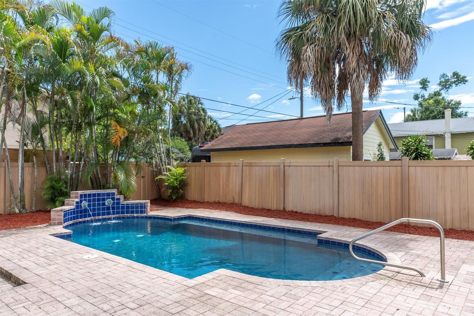 New Resurfaced Pool With Fountain Feature and Back Gate Access to Alley