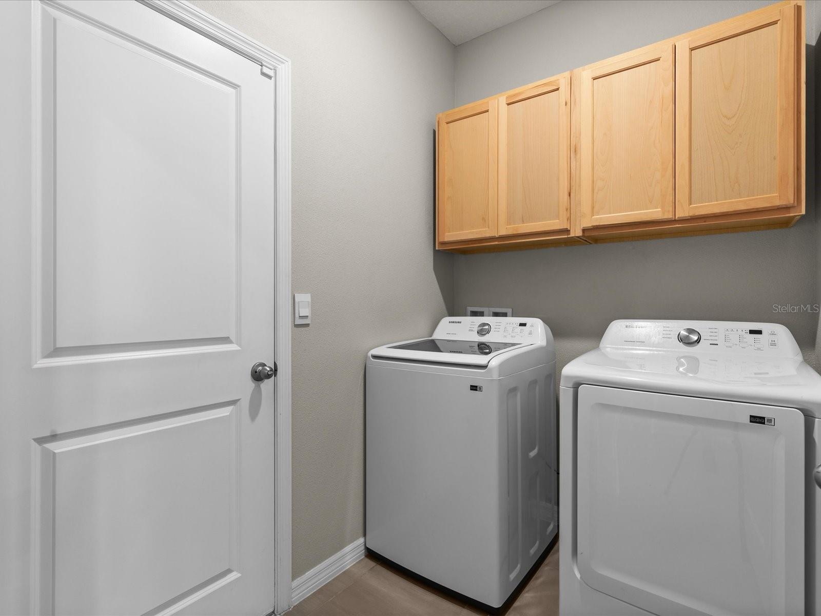 Inside Laundry room with Garage access