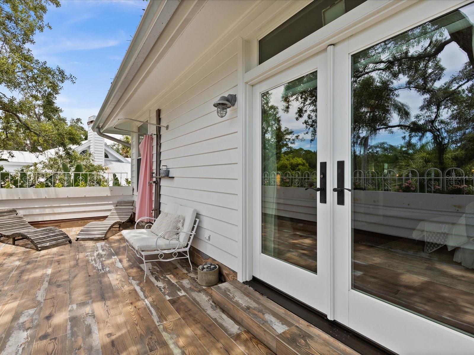 upstairs outdoor shower deck off primary