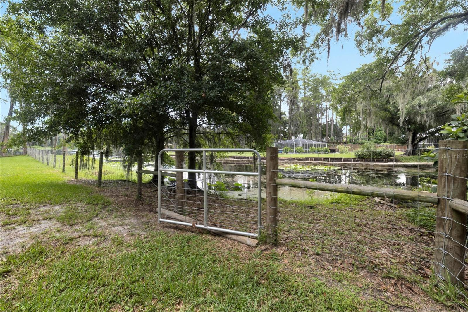 Gate to Lake with 148 feet of shoreline  with plenty of room to build a dock or ramp.