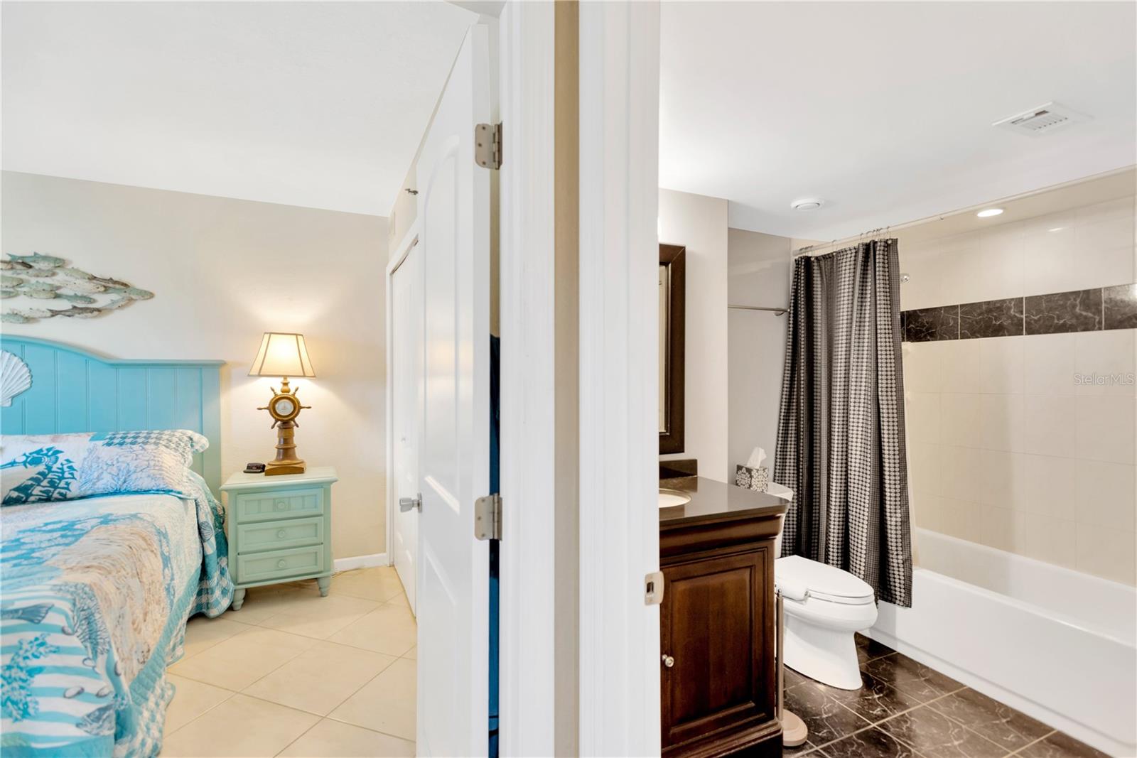 Just outside guest bedroom is a beautifully appointed full guest bath.